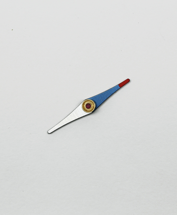 Das Bild zeigt ein präzises, blaugraues Zeigerbauteil mit einer roten Spitze und einer goldfarbenen Verbindung. Es scheint sich um ein Bestandteil eines Experiments oder eines Geräts im Bildungsbereich zu handeln.