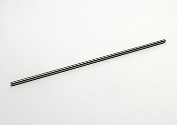 Das Bild zeigt einen langen, schlanken Metallstab, der auf einer neutralen, hellen Fläche liegt. Er könnte für verschiedene Experimente oder Messungen im Bildungsbereich verwendet werden.
