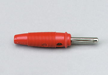 Das Bild zeigt einen roten elektrischen Stecker mit einem metallischen Kontaktstift. Dieses Bauteil wird häufig im Experimentierbedarf für das Bildungswesen verwendet, um elektrische Verbindungen herzustellen.